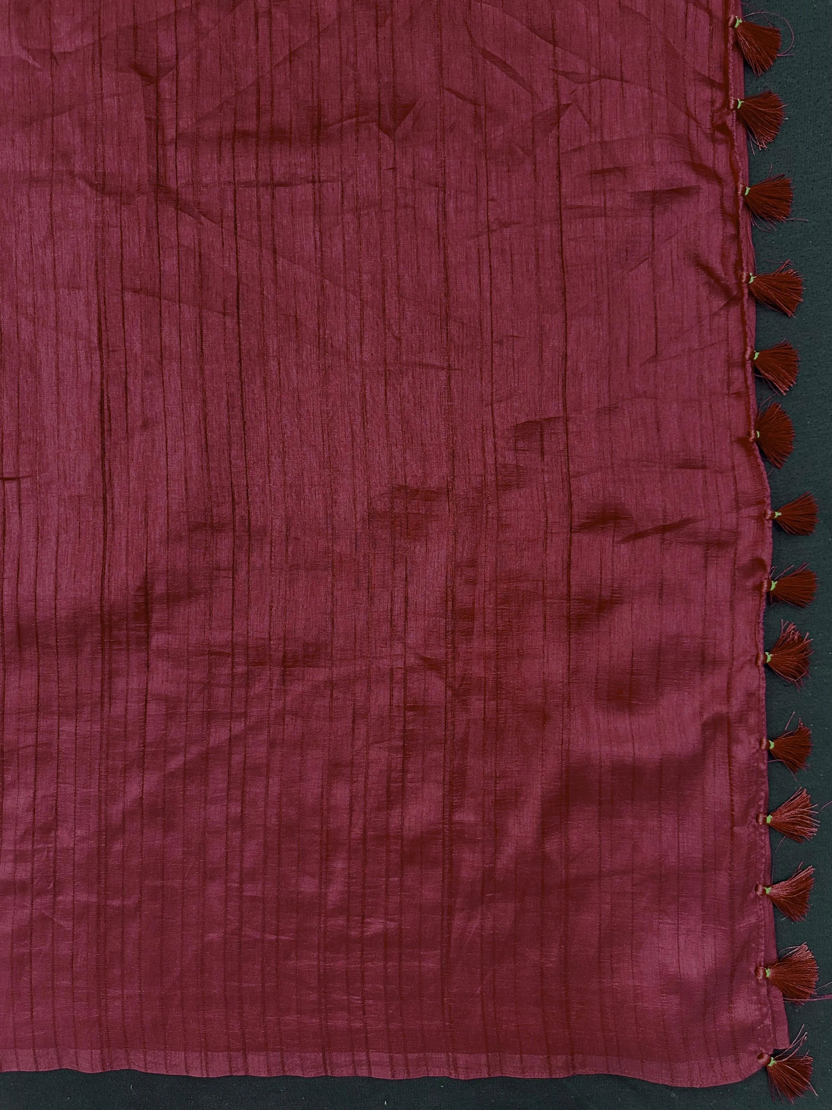 Woman draped in a Soft Tussar Silk Saree with subtle shine and fluid texture, ideal for elegant everyday and festive occasions.