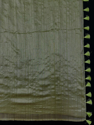 Woman draped in a Soft Tussar Silk Saree with subtle shine and fluid texture, ideal for elegant everyday and festive occasions.