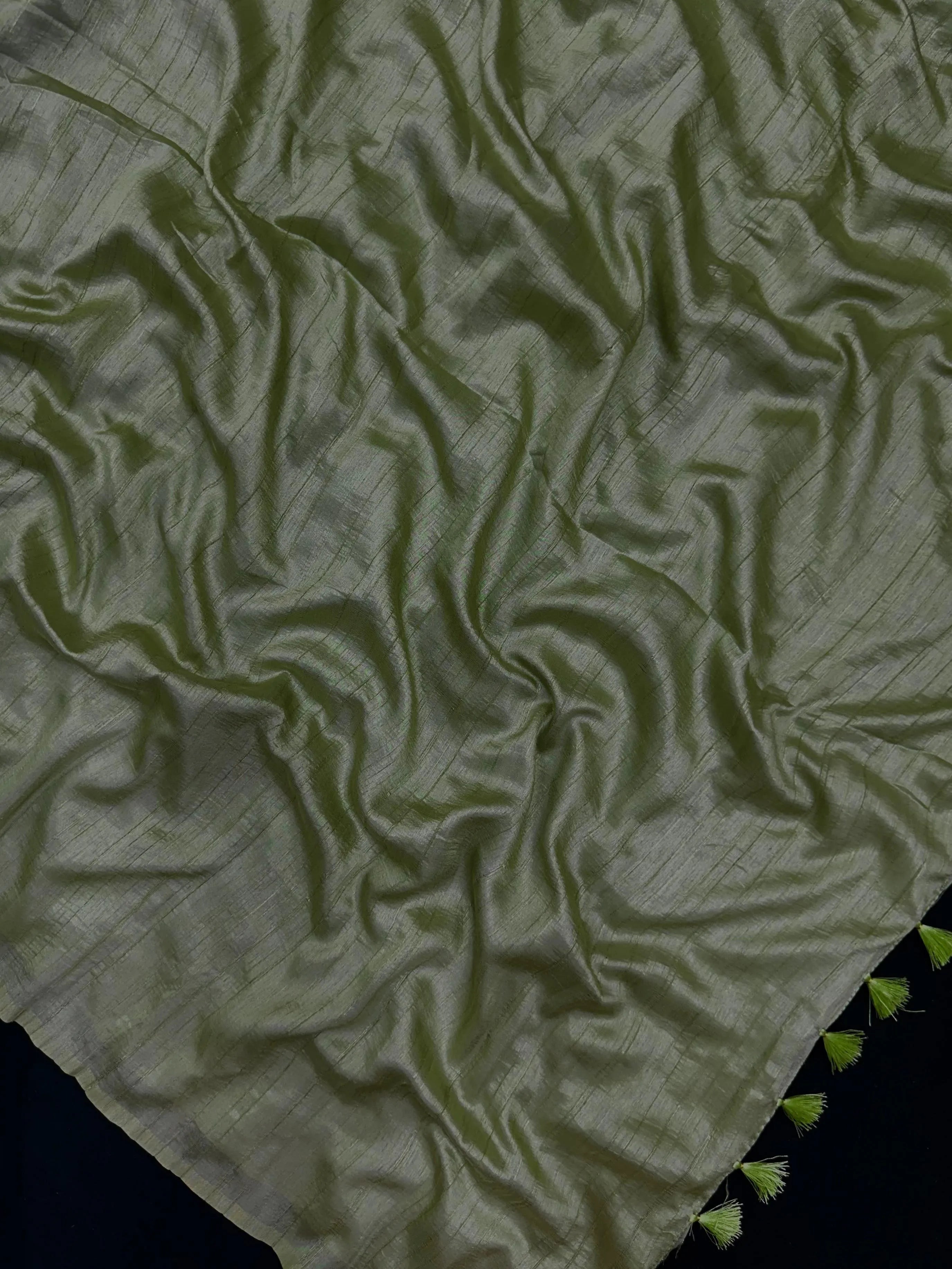 Woman draped in a Soft Tussar Silk Saree with subtle shine and fluid texture, ideal for elegant everyday and festive occasions.