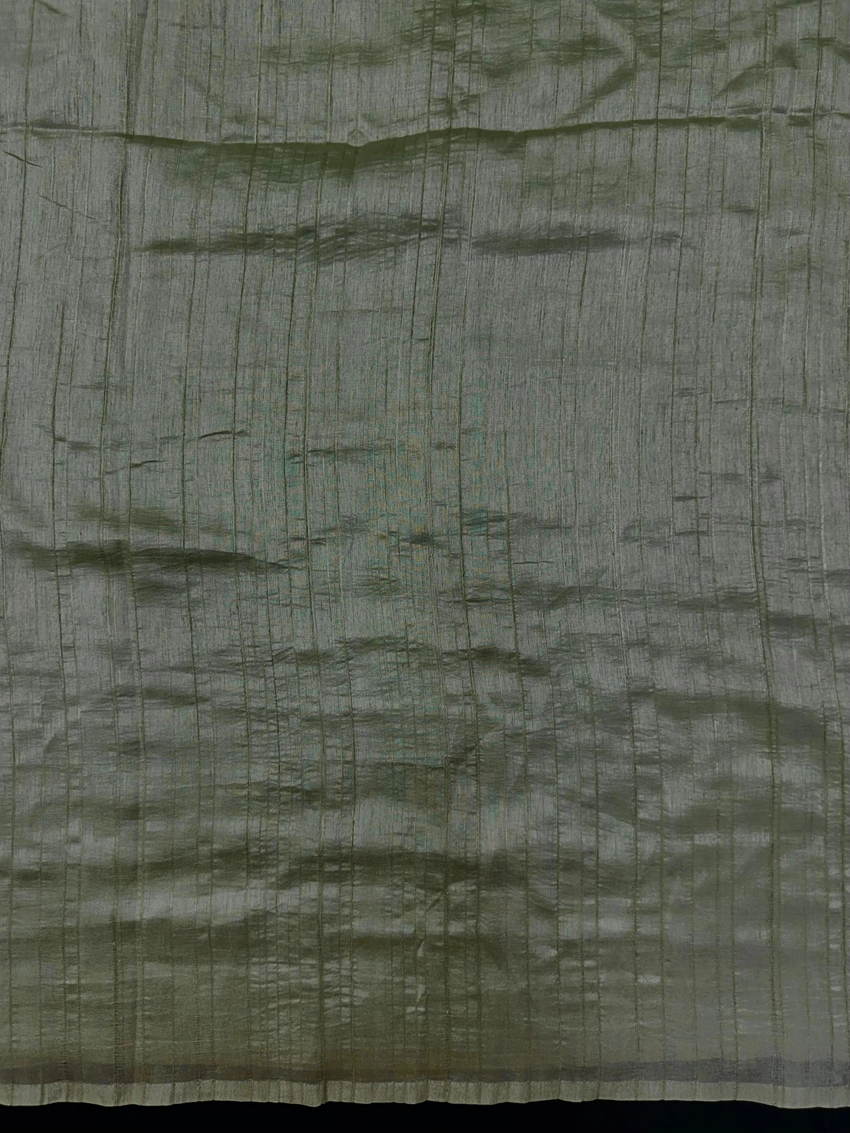 Woman draped in a Soft Tussar Silk Saree with subtle shine and fluid texture, ideal for elegant everyday and festive occasions.