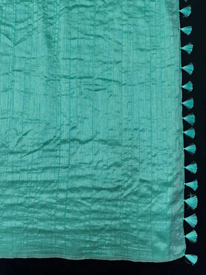 Woman draped in a Soft Tussar Silk Saree with subtle shine and fluid texture, ideal for elegant everyday and festive occasions.