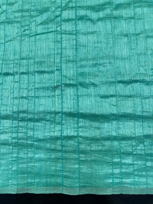 Woman draped in a Soft Tussar Silk Saree with subtle shine and fluid texture, ideal for elegant everyday and festive occasions.