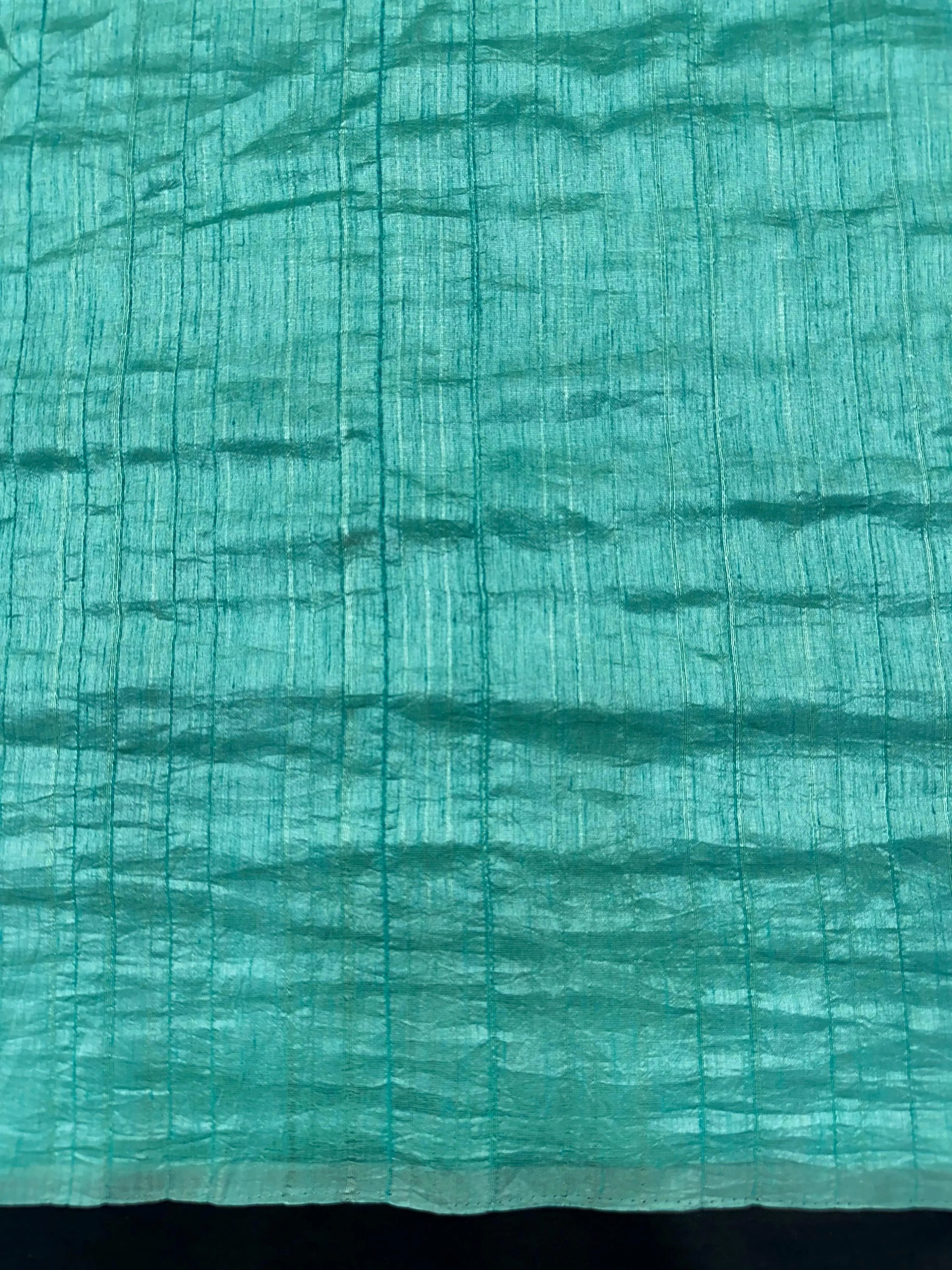 Woman draped in a Soft Tussar Silk Saree with subtle shine and fluid texture, ideal for elegant everyday and festive occasions.