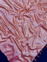 Woman draped in a Soft Tussar Silk Saree with subtle shine and fluid texture, ideal for elegant everyday and festive occasions.