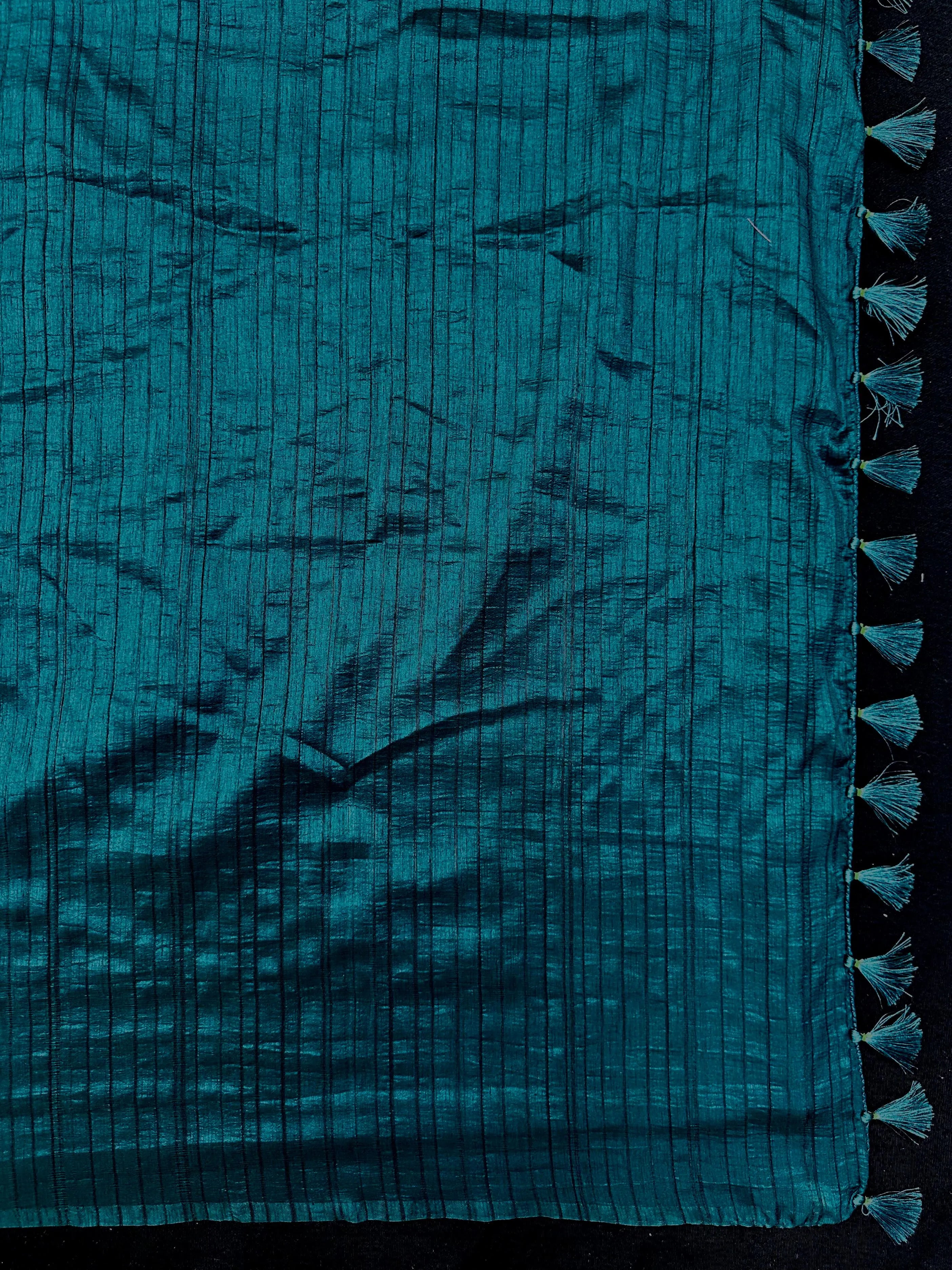 Woman draped in a Soft Tussar Silk Saree with subtle shine and fluid texture, ideal for elegant everyday and festive occasions.