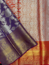 Model draped in a shimmering Tissue Banarasi Silk Saree with zari border, ideal for wedding and festive celebrations.
