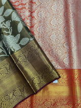 Model draped in a shimmering Tissue Banarasi Silk Saree with zari border, ideal for wedding and festive celebrations.