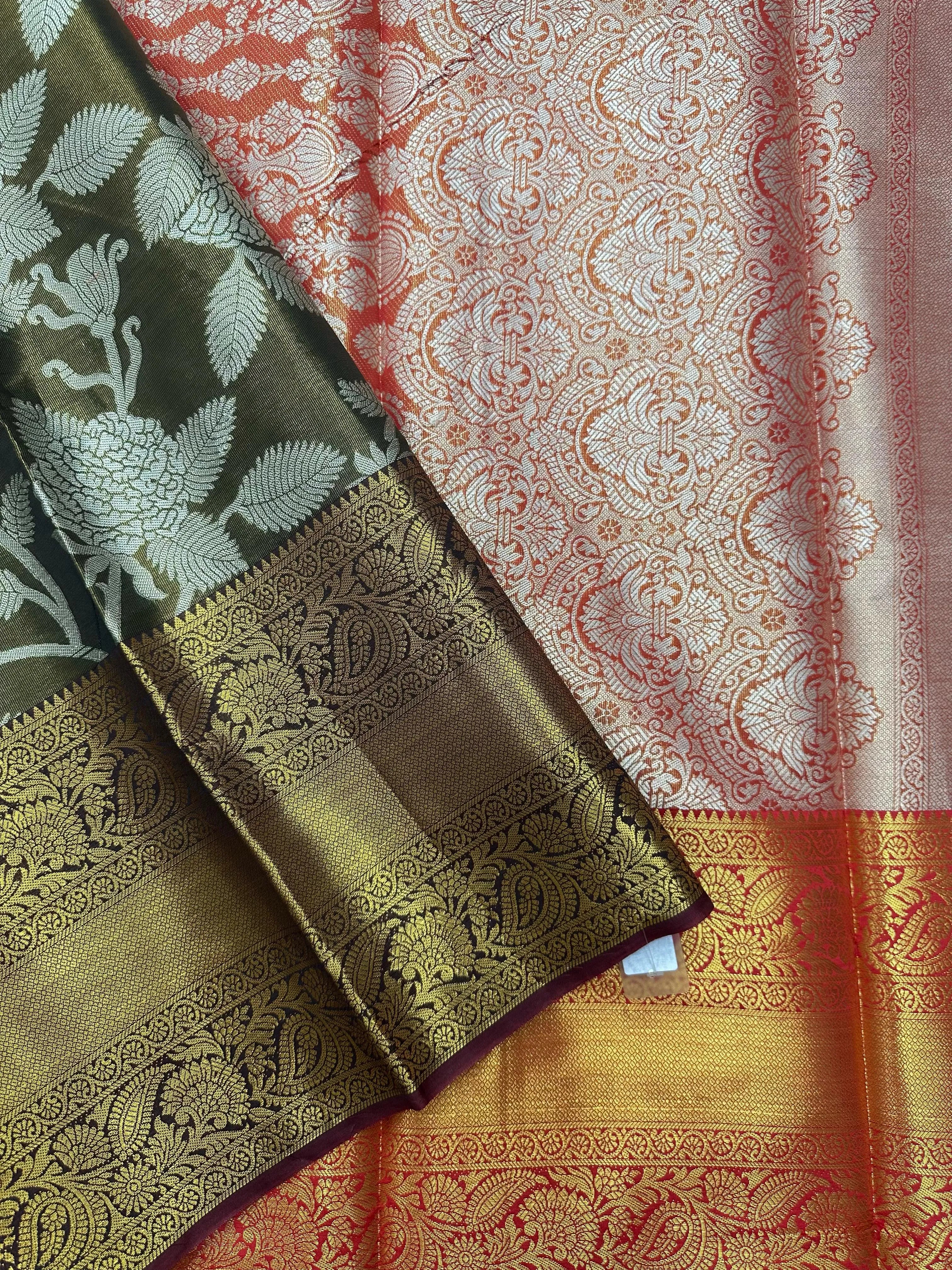 Model draped in a shimmering Tissue Banarasi Silk Saree with zari border, ideal for wedding and festive celebrations.
