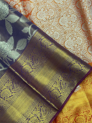 Model draped in a shimmering Tissue Banarasi Silk Saree with zari border, ideal for wedding and festive celebrations.