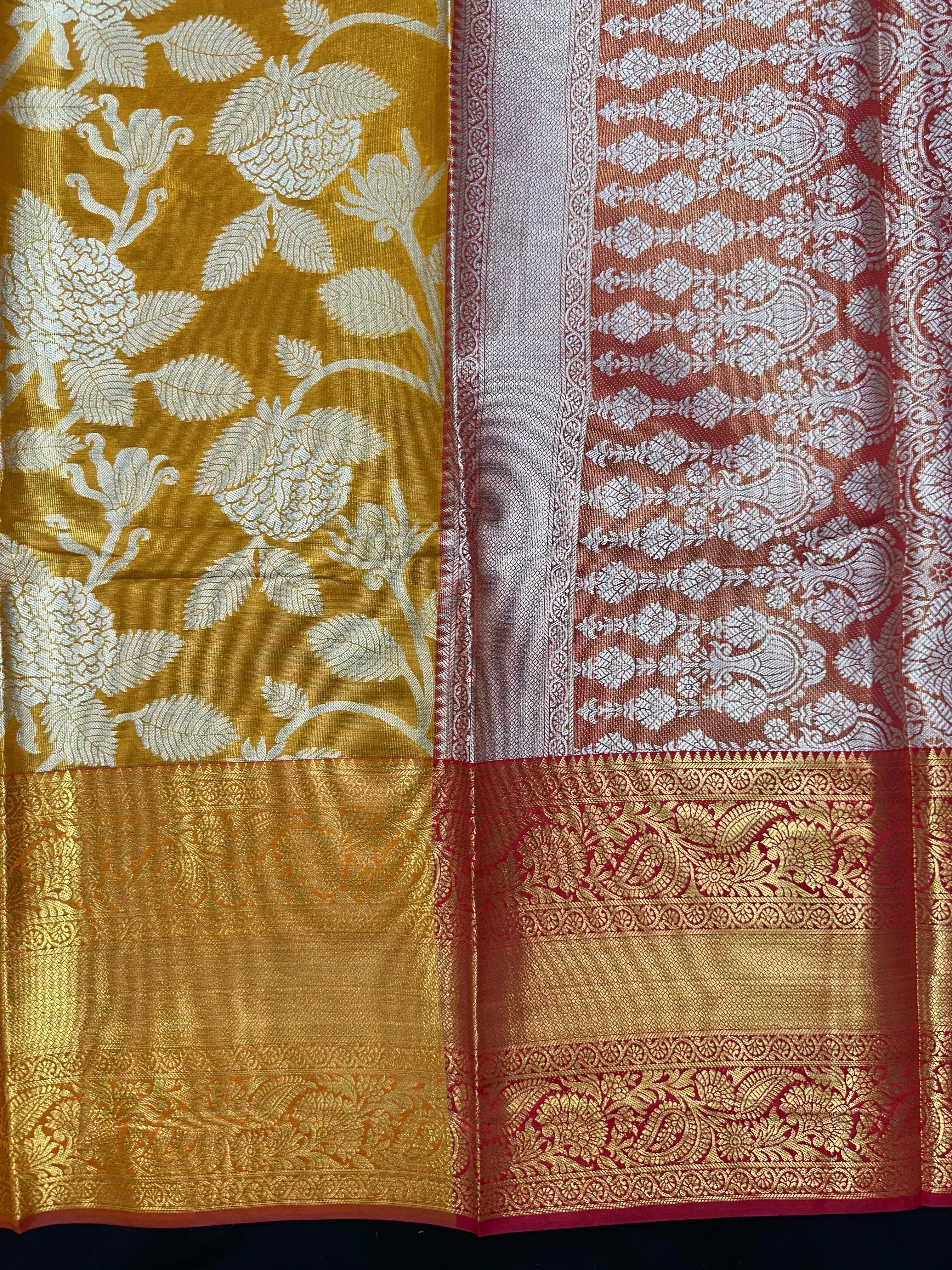 Model draped in a shimmering Tissue Banarasi Silk Saree with zari border, ideal for wedding and festive celebrations.