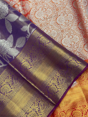 Model draped in a shimmering Tissue Banarasi Silk Saree with zari border, ideal for wedding and festive celebrations.