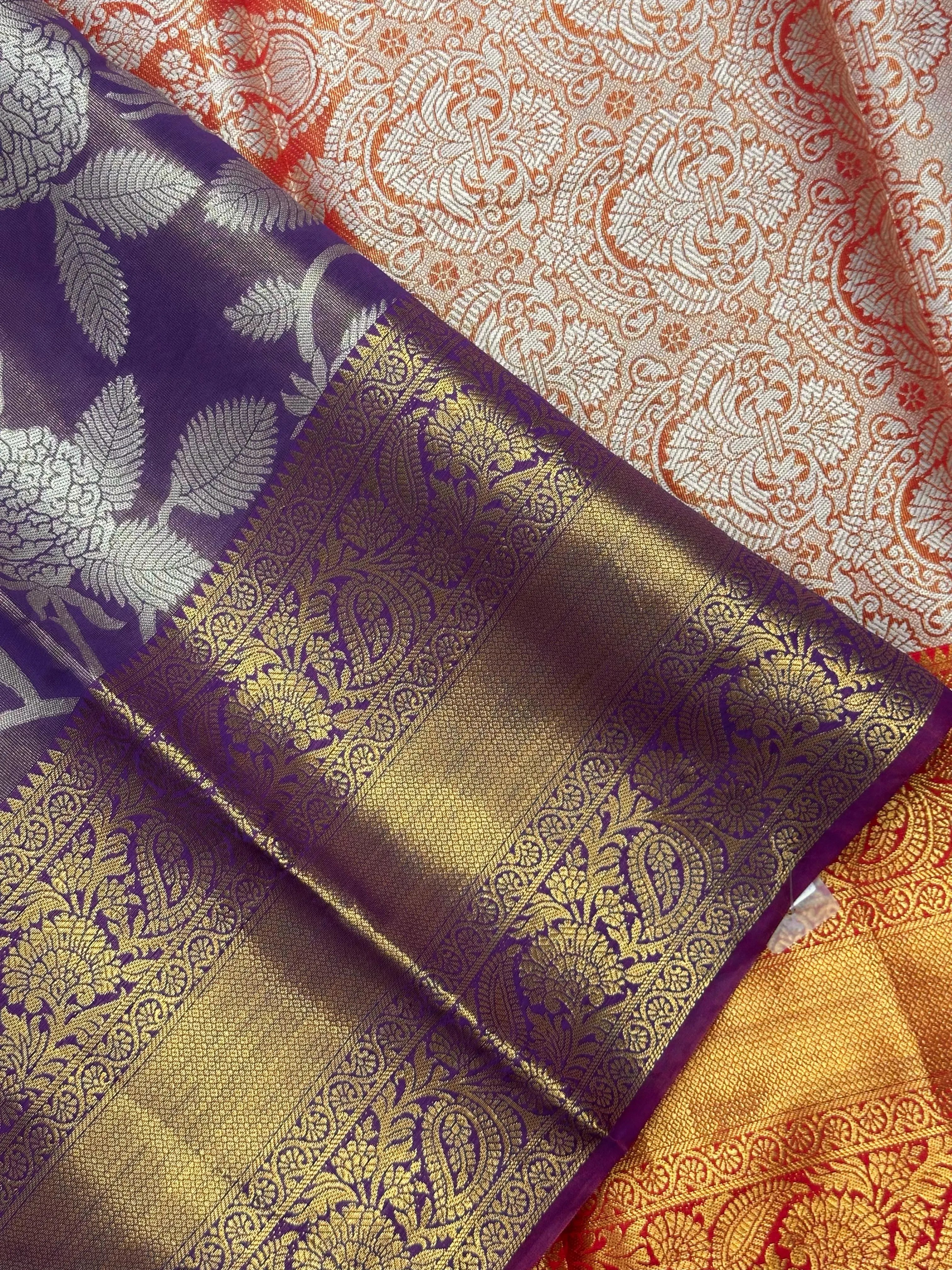 Model draped in a shimmering Tissue Banarasi Silk Saree with zari border, ideal for wedding and festive celebrations.