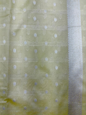 "Tissue Semi Banarasi Saree with intricate Banarasi motifs, made from lightweight, lustrous fabric. Perfect for weddings and festive occasions, offering elegant ethnic wear."