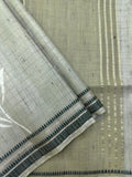 “Woman wearing a lightweight Tussar silk saree in earthy tones, featuring a soft natural sheen and subtle patterns—ideal for elegant daily wear.”