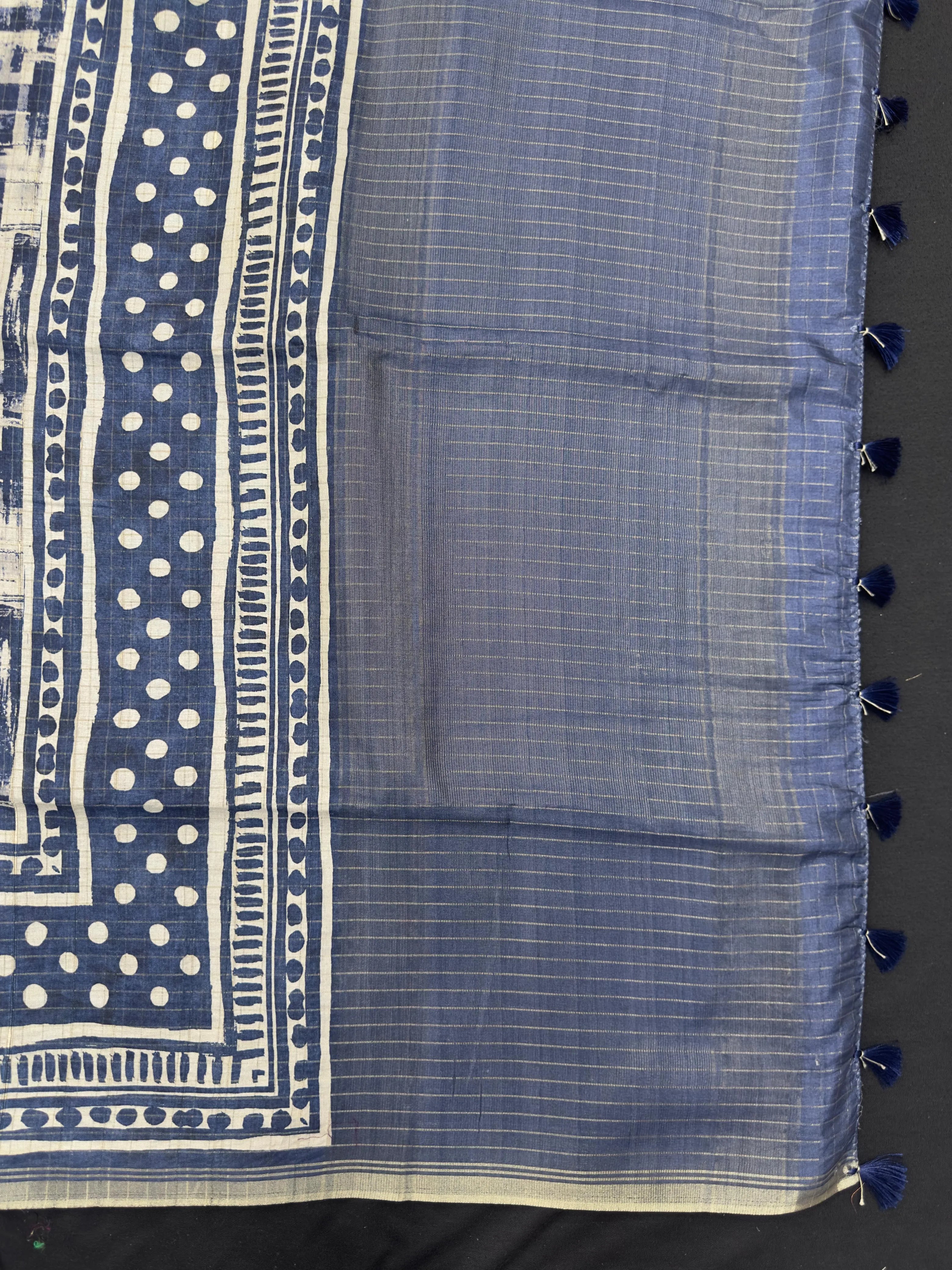 "Luxurious Tussar silk saree with a rich, textured finish, offering timeless elegance and comfort for regular wear."