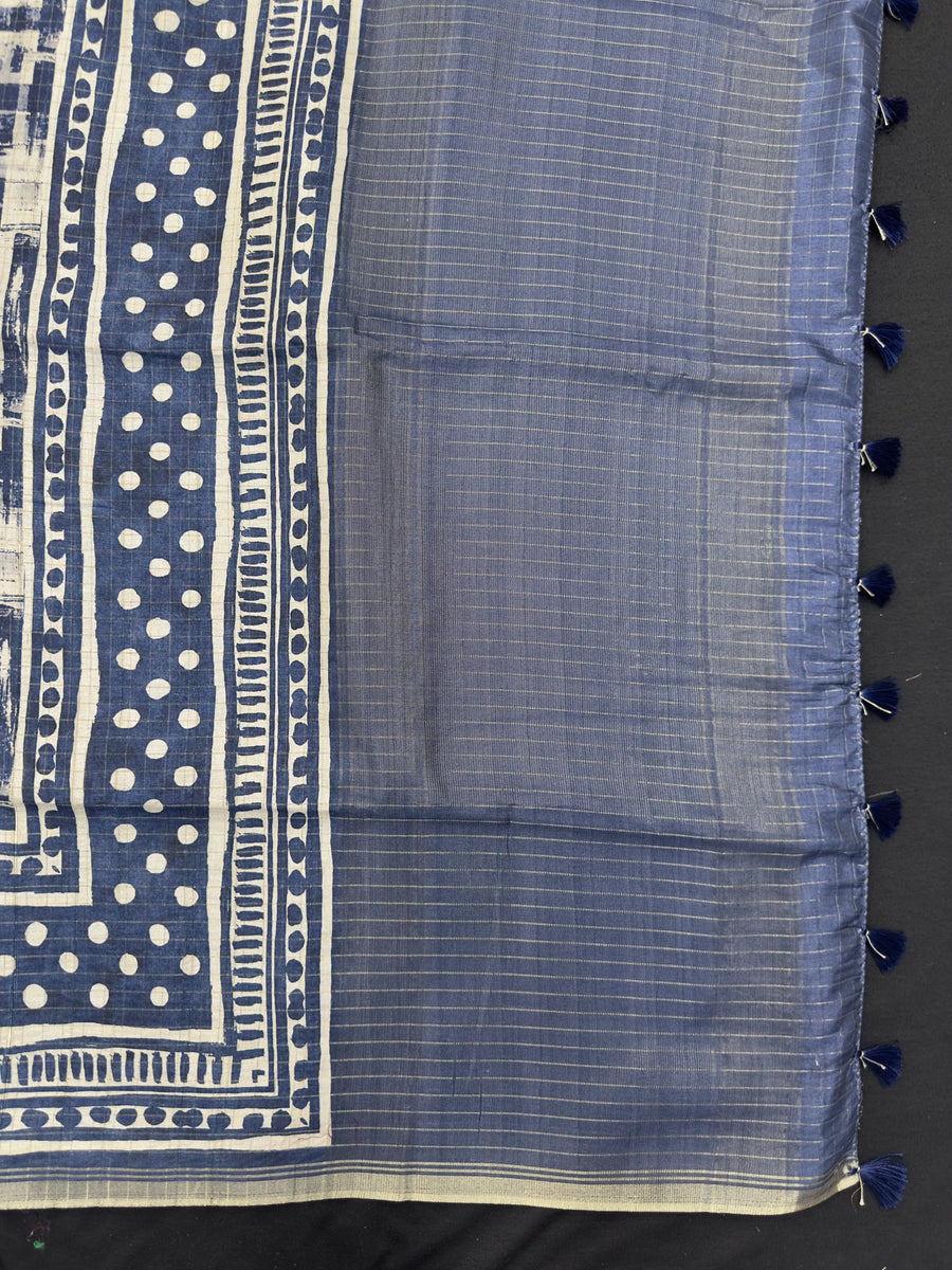 "Luxurious Tussar silk saree with a rich, textured finish, offering timeless elegance and comfort for regular wear."