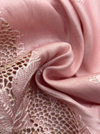  “Elegant woman wearing a graceful Tussar silk saree with a soft sheen, fine texture, and minimalistic patterns—ideal for regular wear with a touch of timeless sophistication.”