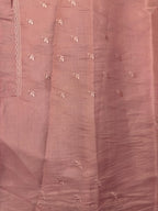  “Elegant woman wearing a graceful Tussar silk saree with a soft sheen, fine texture, and minimalistic patterns—ideal for regular wear with a touch of timeless sophistication.”