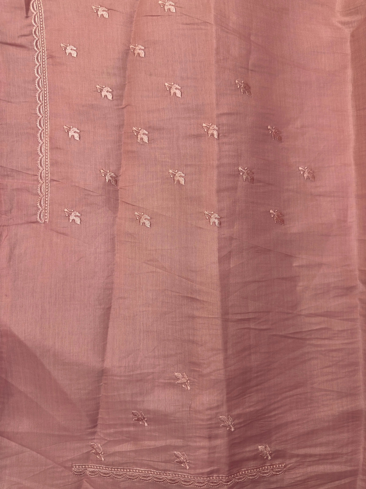  “Elegant woman wearing a graceful Tussar silk saree with a soft sheen, fine texture, and minimalistic patterns—ideal for regular wear with a touch of timeless sophistication.”