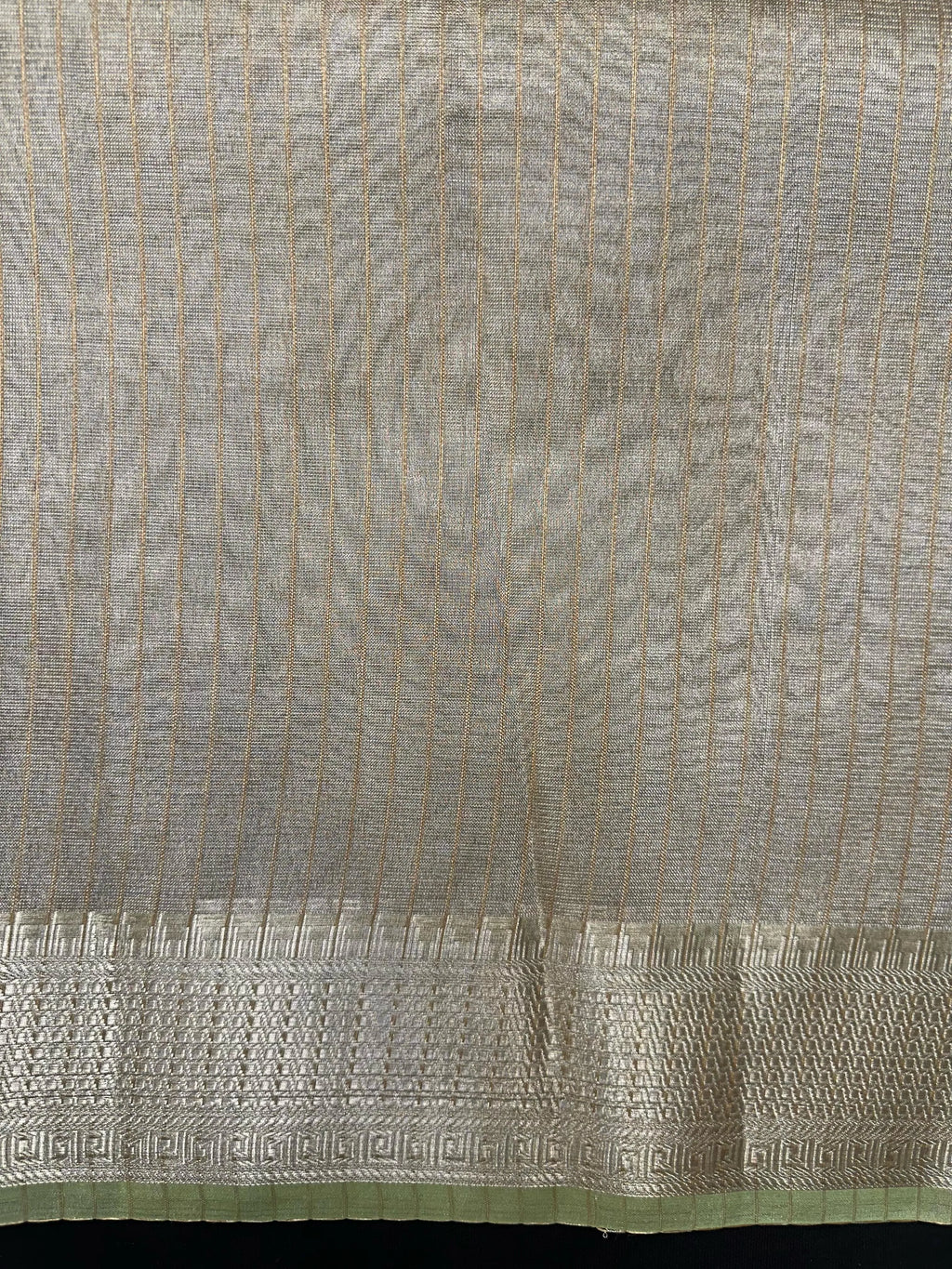 Woman wearing a Tussar Silk Saree with natural texture and subtle sheen, ideal for weddings, festivals, and cultural events.