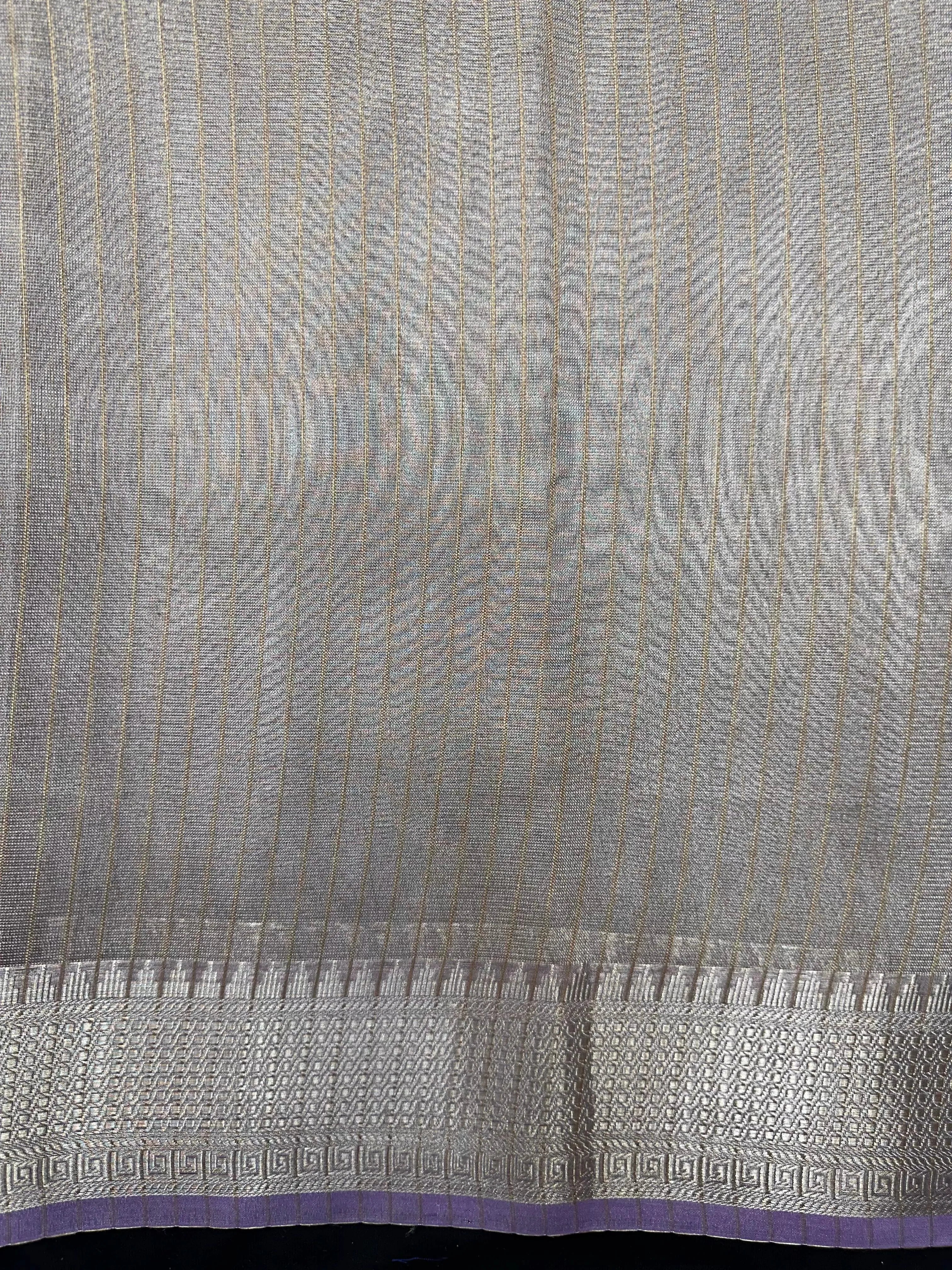 Woman wearing a Tussar Silk Saree with natural texture and subtle sheen, ideal for weddings, festivals, and cultural events.