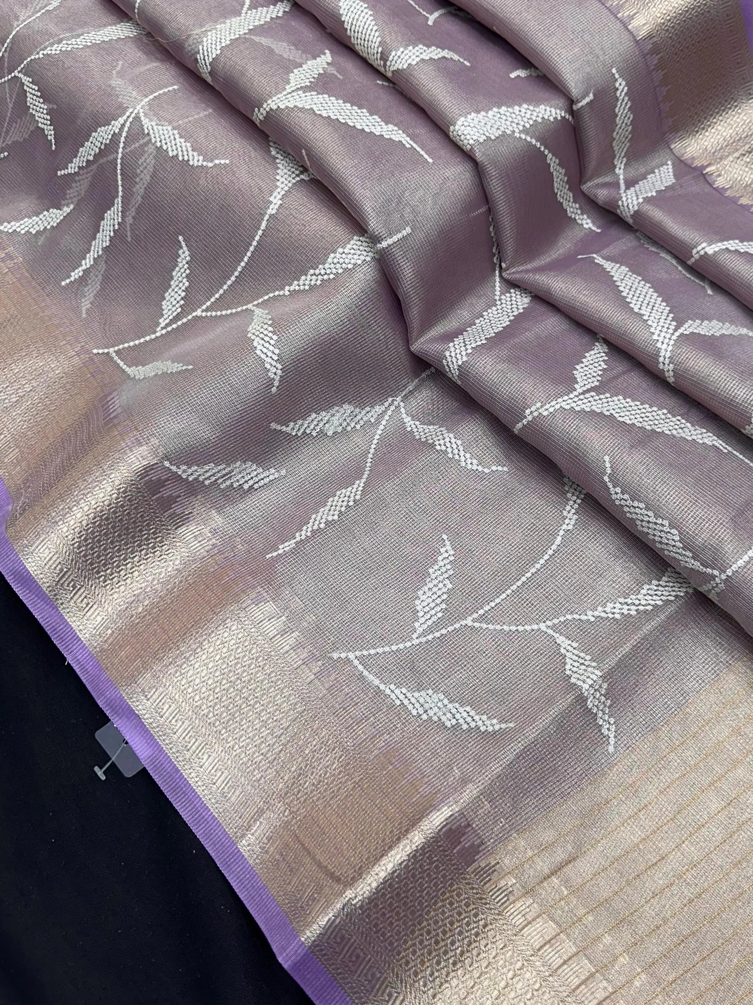 Woman wearing a Tussar Silk Saree with natural texture and subtle sheen, ideal for weddings, festivals, and cultural events. 