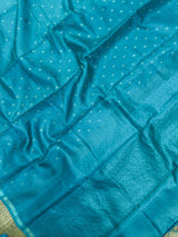 "Elegant Tussar silk saree in a sleek design, perfect for daily wear. The soft, breathable fabric features a subtle sheen and sophisticated drape, offering a timeless and comfortable look for any occasion."