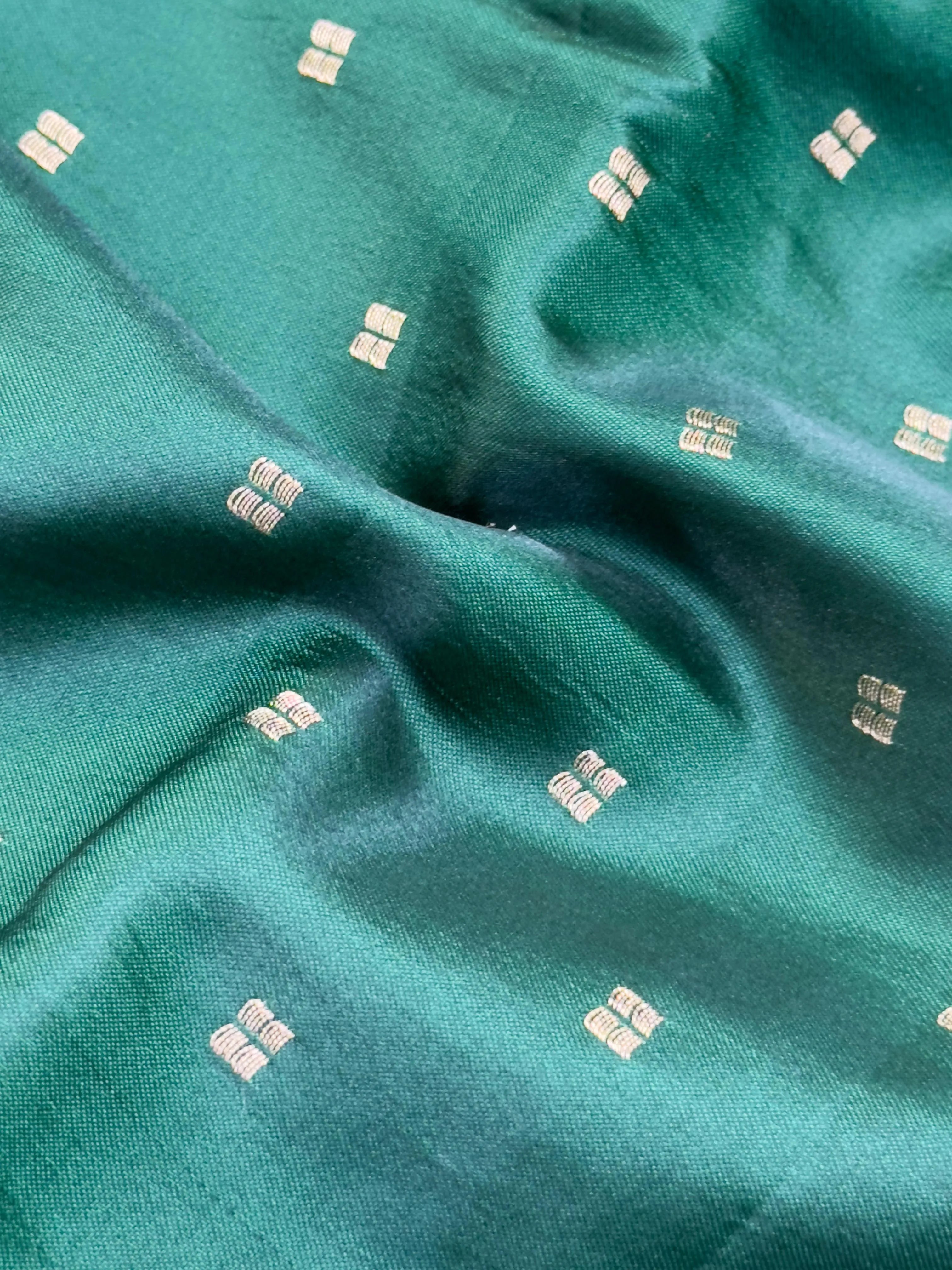 "Elegant Tussar silk saree in a sleek design, perfect for daily wear. The soft, breathable fabric features a subtle sheen and sophisticated drape, offering a timeless and comfortable look for any occasion."